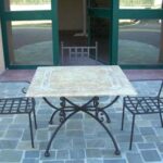 Tavolo con sedie in ferro battuto