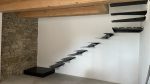 Scala a sbalzo con parete portante